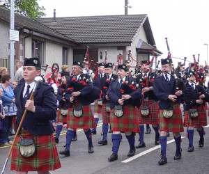 Pipe band at station re-opening station-pipe-band